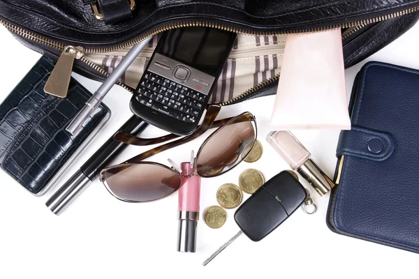 Innehållet i damernas handväska — Stockfoto