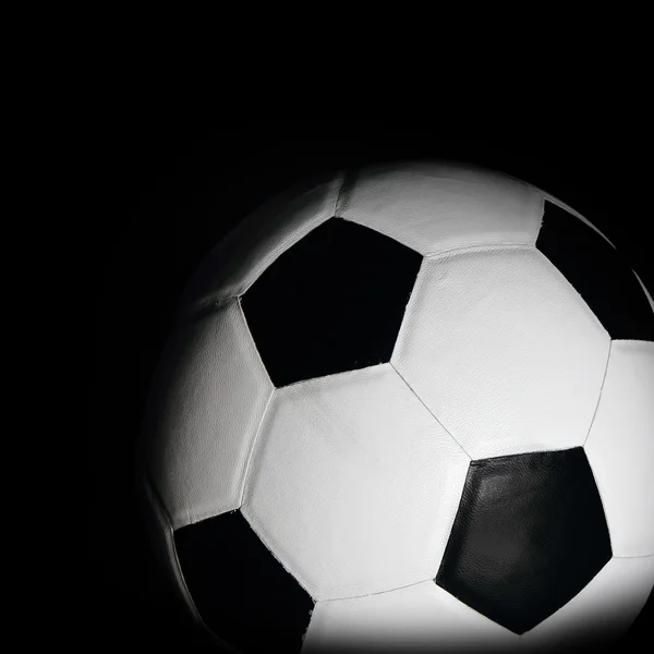 Футбольный мяч в черном — стоковое фото