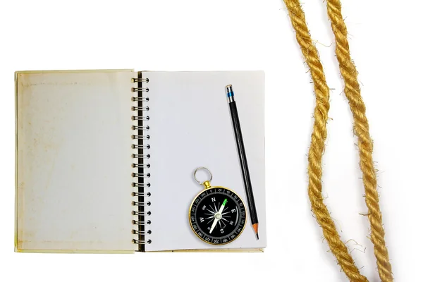 Kompas knihy a tužky — Stock fotografie
