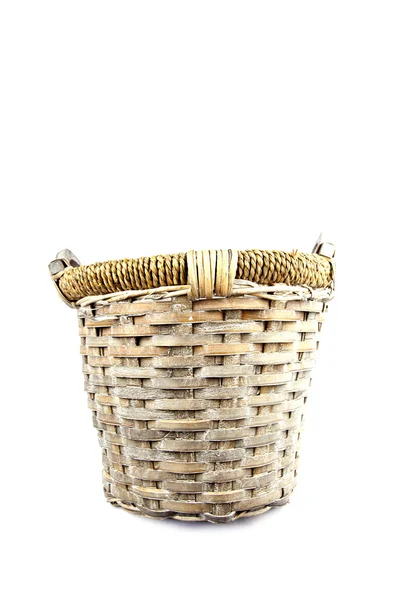 Old basket made of reed isolated on white background — Stock Photo, Image