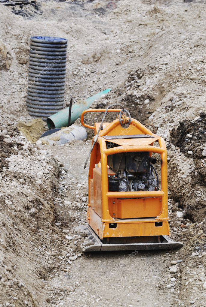 Construction Site With Compactor — Stock Photo © manfredxy 9905072