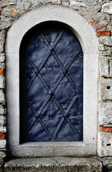 Old black iron door — Stock Photo, Image