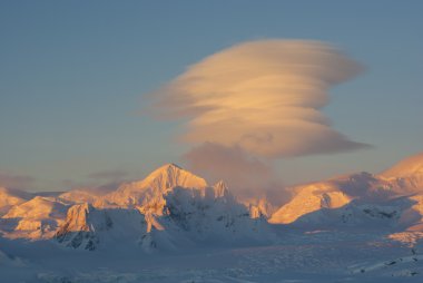 Lenticular clouds in the Antarctic. clipart