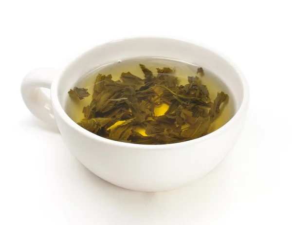 Чашка с зеленым чаем . — стоковое фото