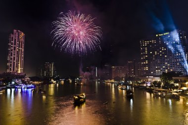 BANGKOK-Jan 01:The happy new year 2011 exploding fireworks clipart