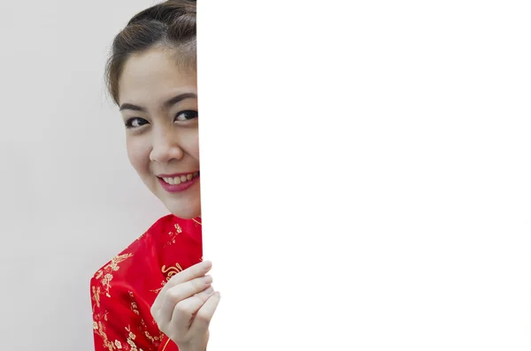 Oriental girl wishing you a happy chinese new year,copy space — Stock Photo, Image