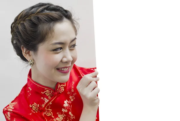 Oriental girl wishing you a happy chinese new year, copy space — стоковое фото
