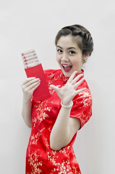 Kínai újév. A kínai egy piros csomag egy pénzbeli ajándék — Stock Fotó