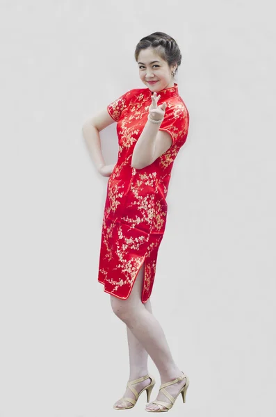 Lächelnd schöne chinesische junge Frau gestikuliert mit Tradition c — Stockfoto