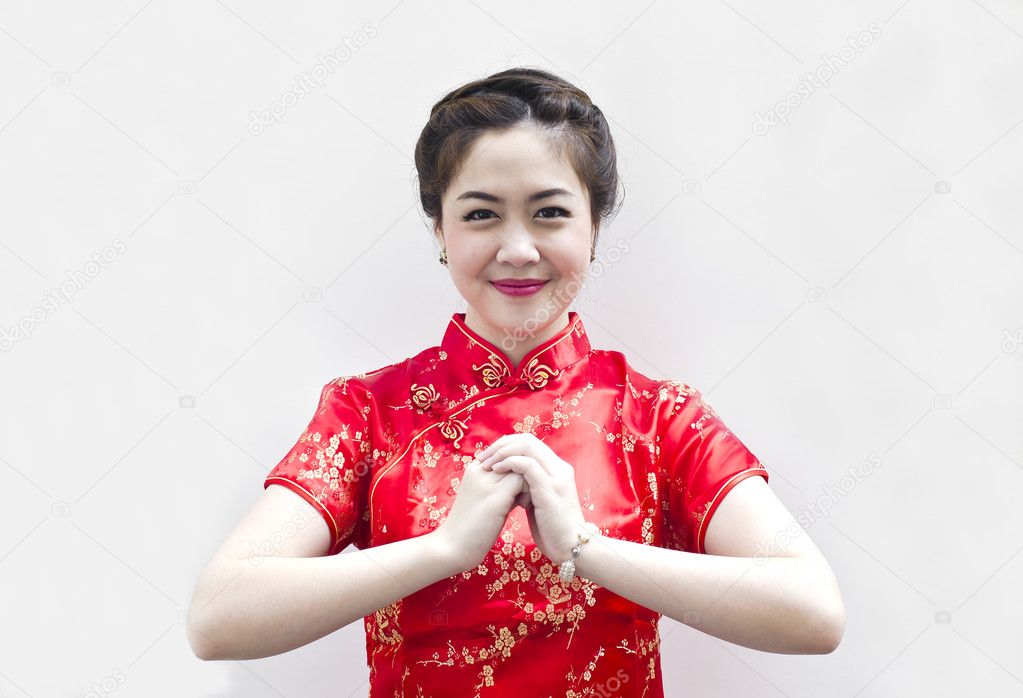 Happy Chinese new year. beautiful Asian woman with gesture of co