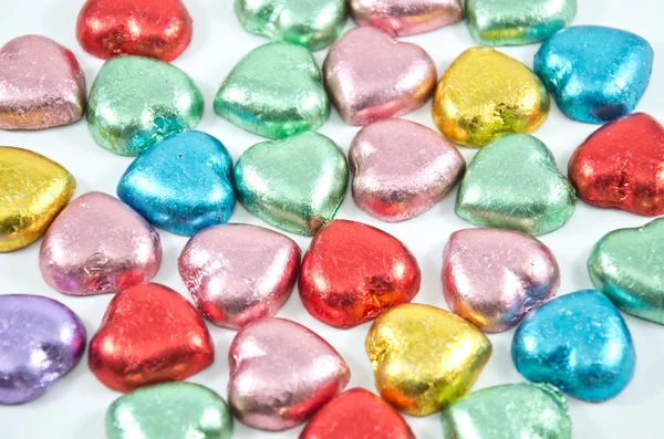 stock image Colorful chocolate hearts candies,isolated