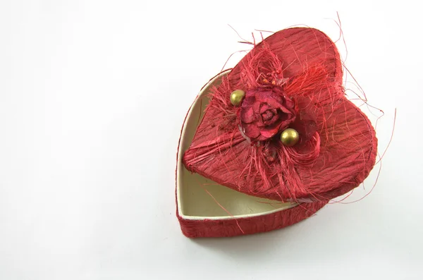 Rött hjärta låda med rose Royaltyfria Stockbilder