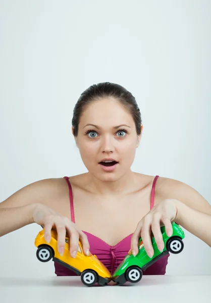 Chica con coches de juguete — Foto de Stock