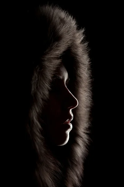 Silhouette of a girl in the hood — Stock Photo, Image