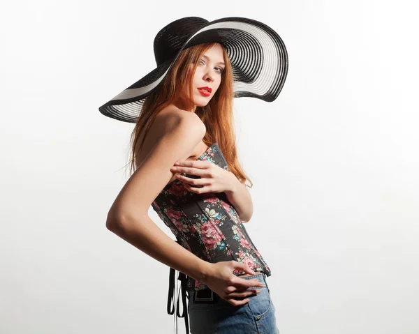 Girl in a broad-brimmed hat — Stock Photo, Image