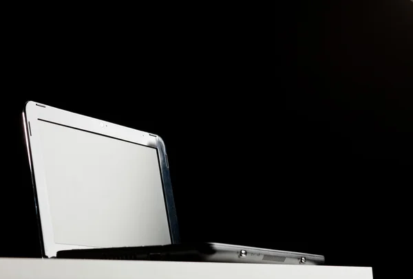 Stock image Laptop on a table