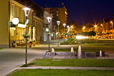 Town of Krizevci walkway night scene clipart