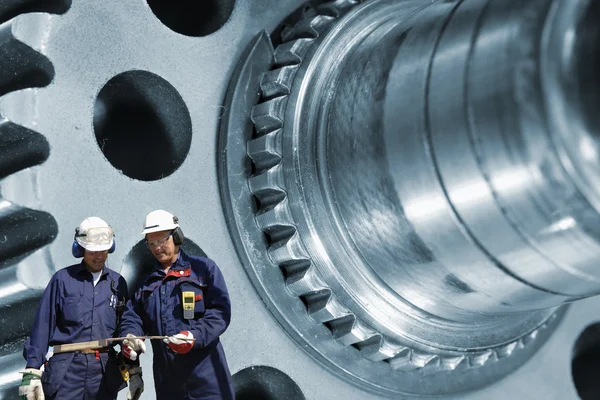 Industry workers and gears — Stock Photo, Image