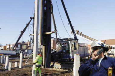 Workers and construction site clipart