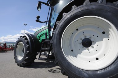 Giant farming tractor clipart