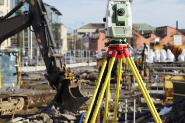 Geodesy measuring inside building site clipart