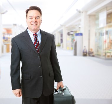 Business Traveler in Airport clipart