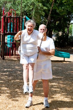 Senior Couple - Playground Fun clipart