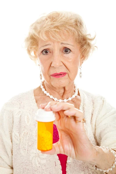 Mulher Sênior triste com pílulas — Fotografia de Stock