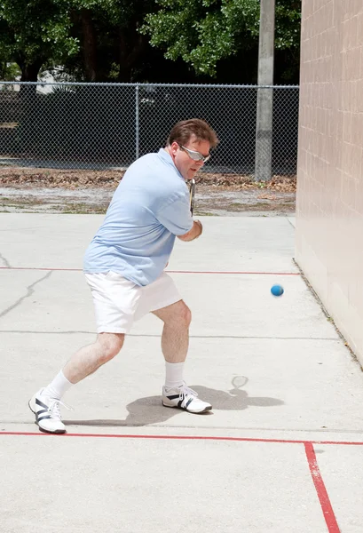 Agresszív squash játékos — Stock Fotó