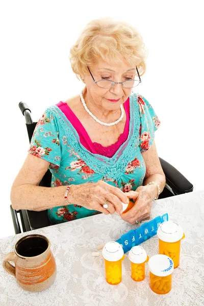 Mulher deficiente toma remédio — Fotografia de Stock