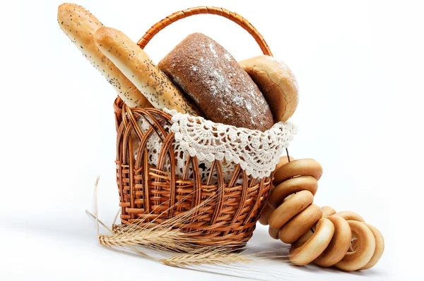 Fresh bread in the basket fully isolated. — Stock Photo, Image