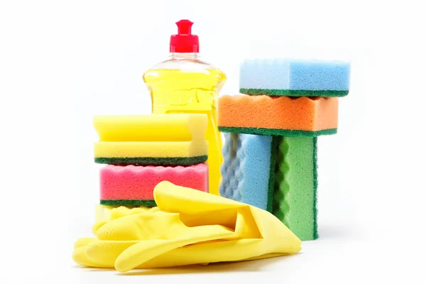 Butelka detergentu, gumowe rękawice i czyszczenia gąbki na biały b — Zdjęcie stockowe