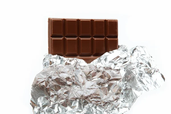 Chocolate bar in foil isolated on white background — Stock Photo, Image