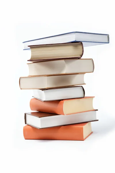 Ein Stapel Bücher auf weißem Hintergrund. — Stockfoto