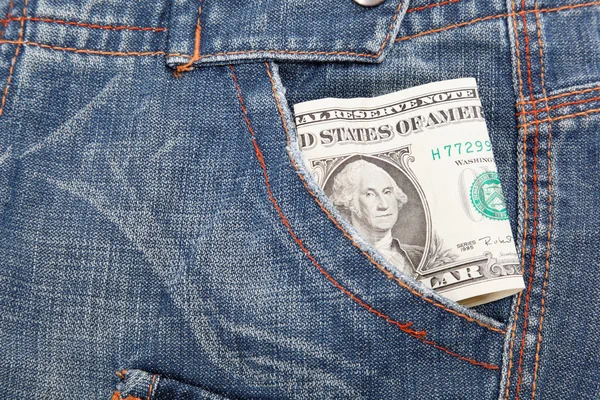 Dollar bill in his pocket jeans. — Stock Photo, Image
