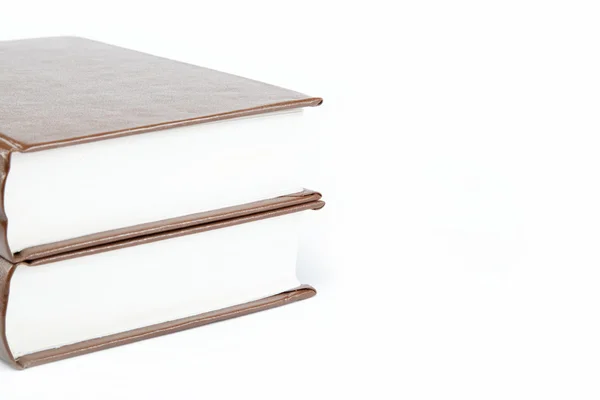 Una pila de libros sobre un fondo blanco . —  Fotos de Stock