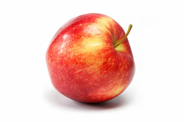 Manzana roja natural jugosa madura sobre un fondo blanco . — Foto de Stock