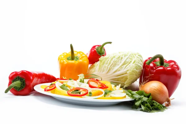 Healthy food. Fresh vegetables and salad on a white background. — Stock Photo, Image