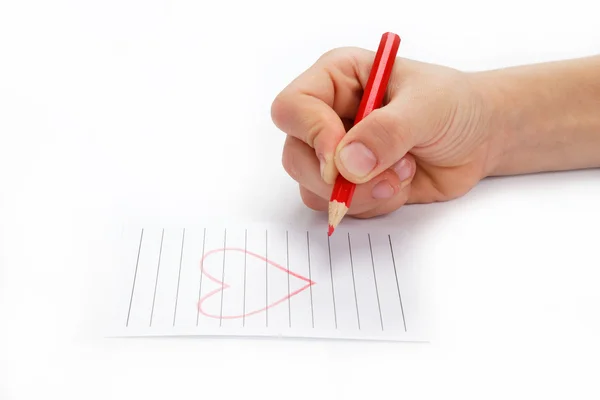 Dzieci ręcznie ołówkiem rysuje heartl, na białym tle — Zdjęcie stockowe