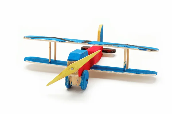 Children's creativity. Handmade wooden model airplane. — Stock Photo, Image