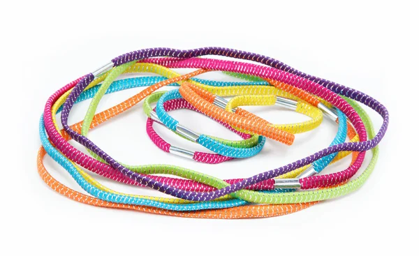 Colorful hair elastic bands on white background — Stock Photo, Image