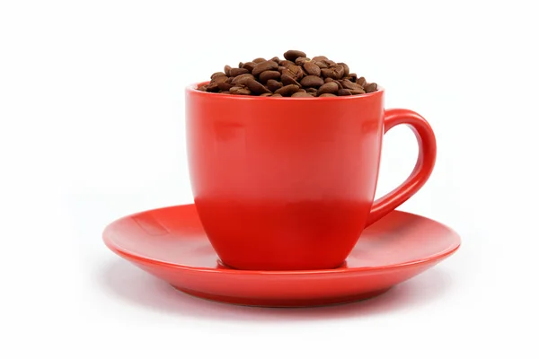 Cup with beans coffee on saucer — Stock Photo, Image