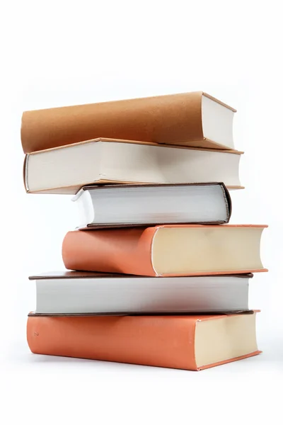Hromada knih na bílém pozadí. — Stock fotografie