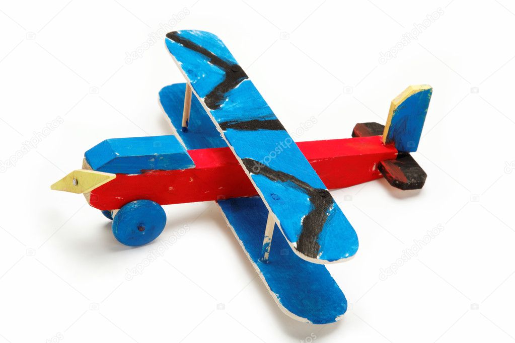 Children's creativity. Handmade wooden model airplane.