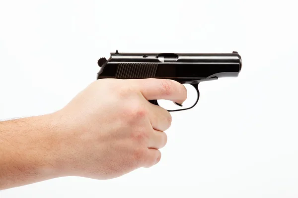 Gun in hand op een witte achtergrond. — Stockfoto