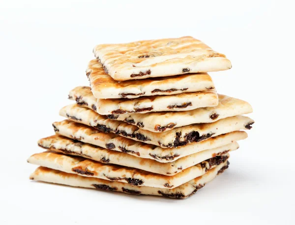 A stack of cookies with caramel filling on a white background. — Stock Photo, Image