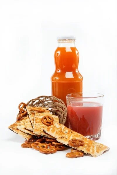 stock image Light lunches. Crunchy biscuits and juice on a white background.