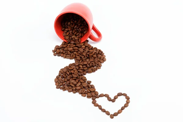 Coeur des grains de café d'une tasse renversée . — Photo