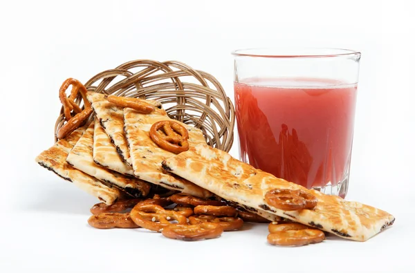 stock image Light lunches. Crunchy biscuits and juice on a white background.