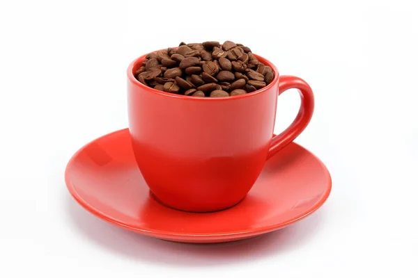 Fasulye fincan tabağı üzerinde kahve Kupası — Stok fotoğraf